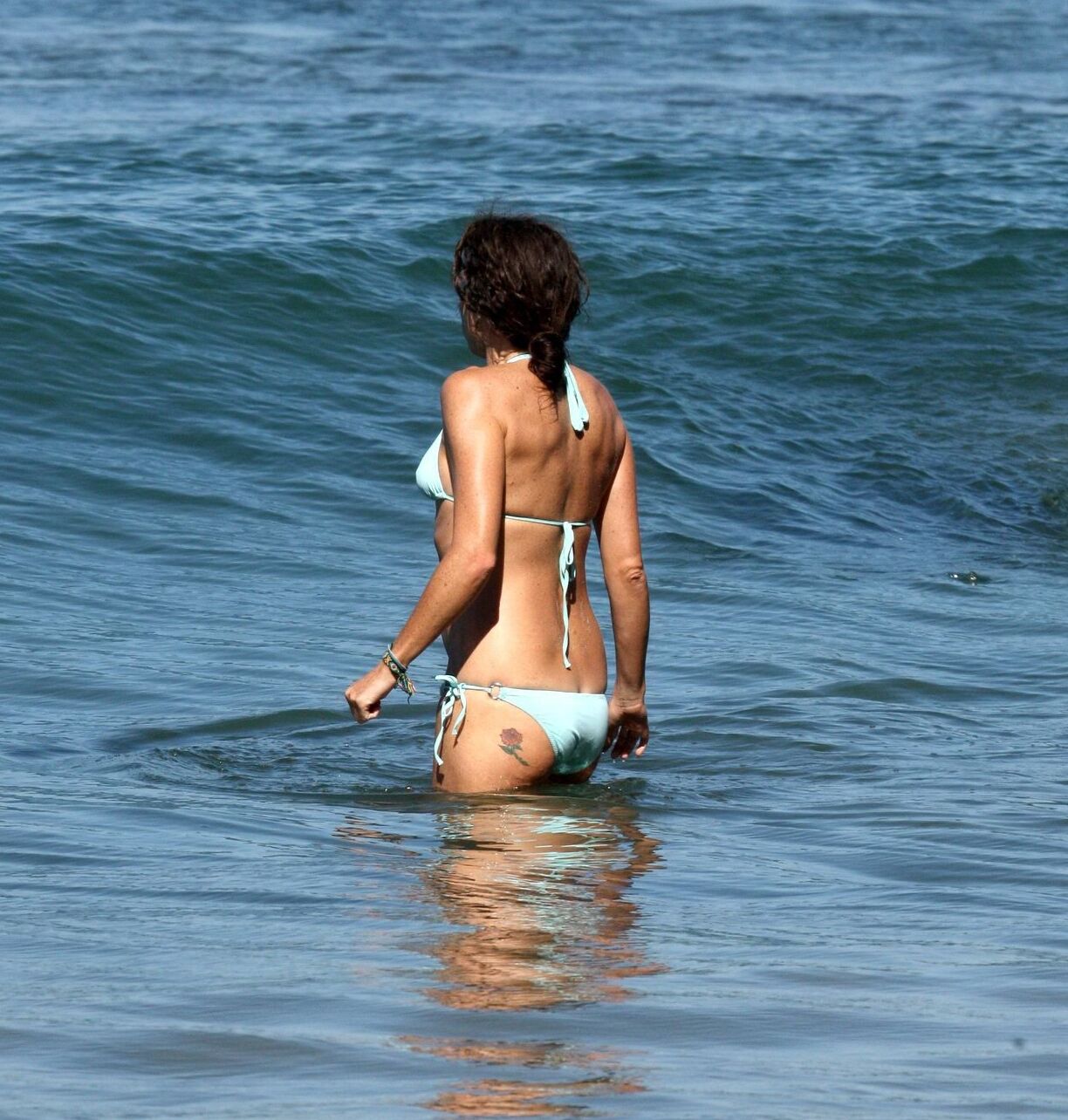 Minnie Driver wearing sky blue bikini on the beach in Malibu