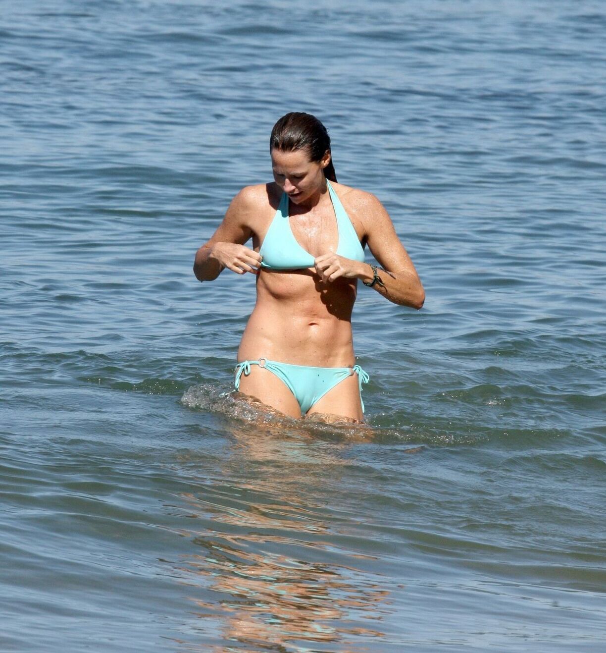Minnie Driver wearing sky blue bikini on the beach in Malibu