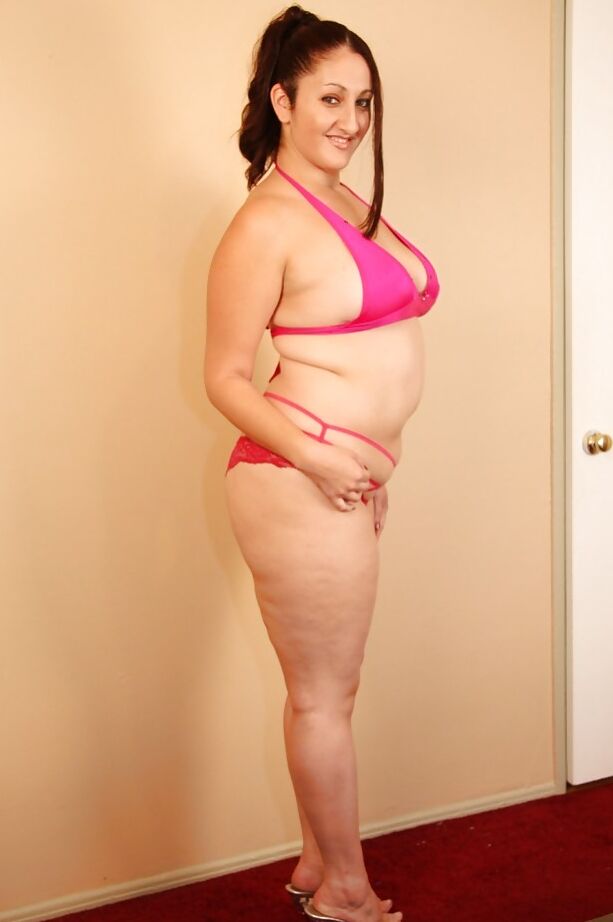 Plump Latina brunette Sonia Blaze exposing her fat natural breasts
