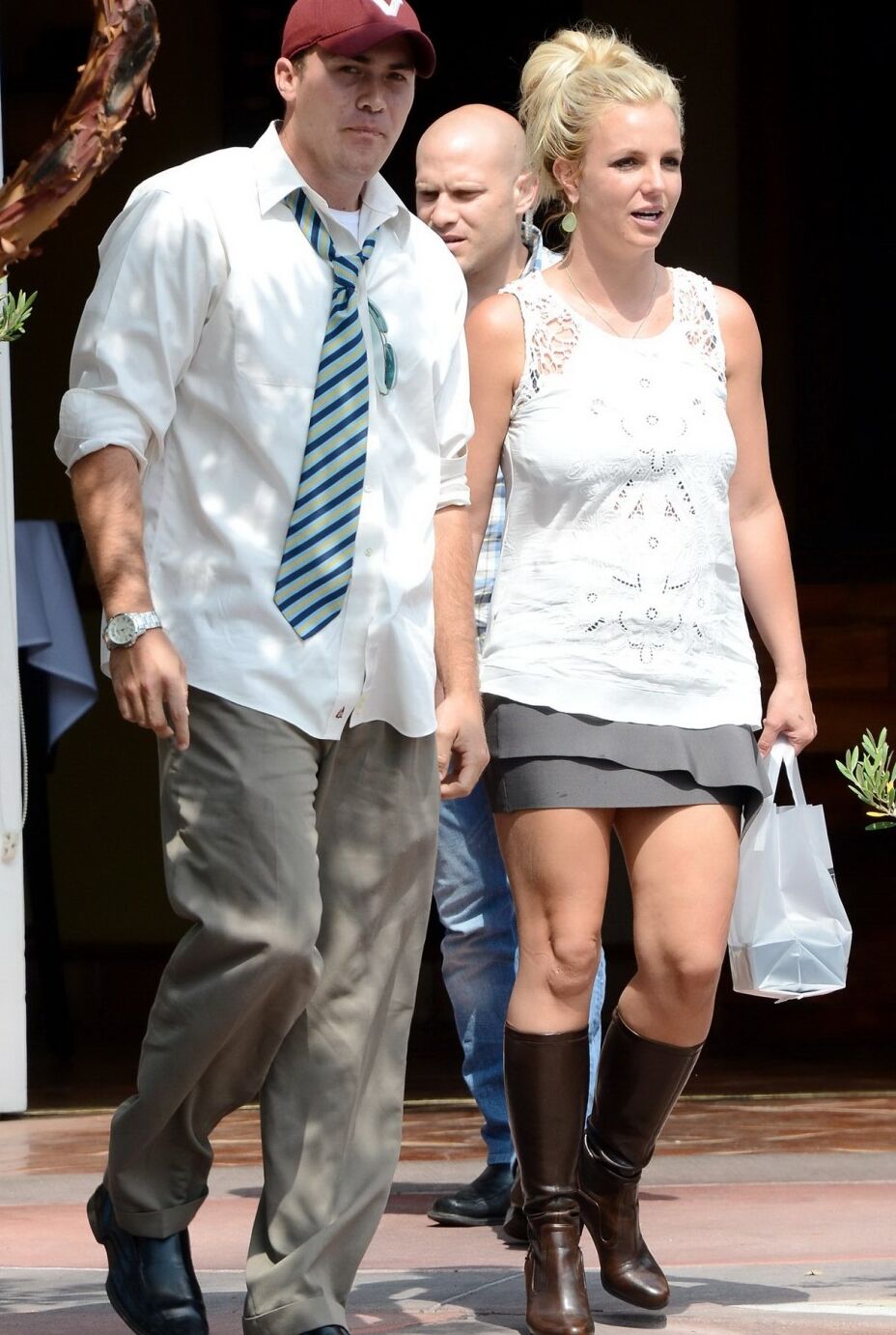 Britney Spears leggy in mini skirt boots arriving at a recording studio in Holl