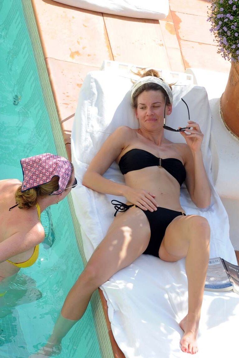 Hilary Swank exposing her fucking sexy body and hot ass in bikini on pool