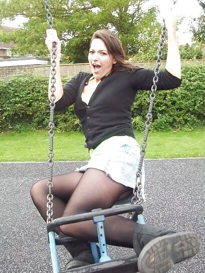 Babes in pantyhose-girl on a swing.