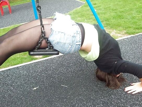 Babes in pantyhose-girl on a swing.