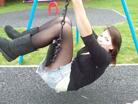 Babes in pantyhose-girl on a swing.