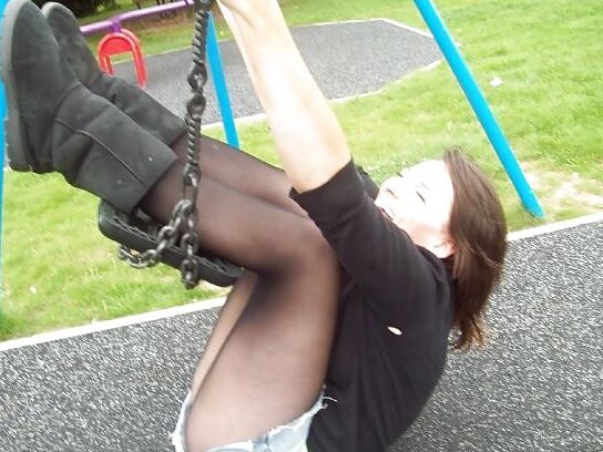 Babes in pantyhose-girl on a swing.