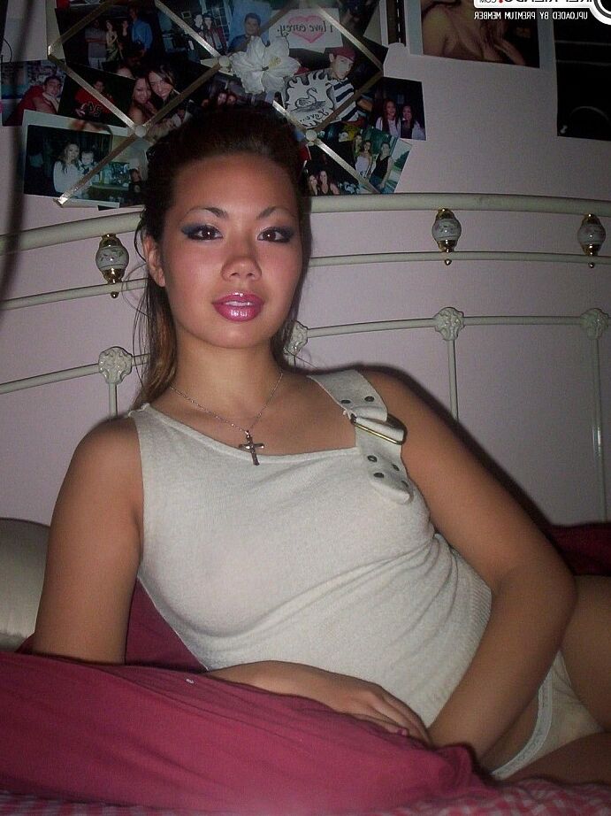 Beautiful asian girl shows her boobs