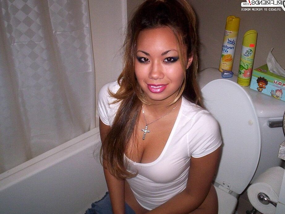 Beautiful asian girl shows her boobs