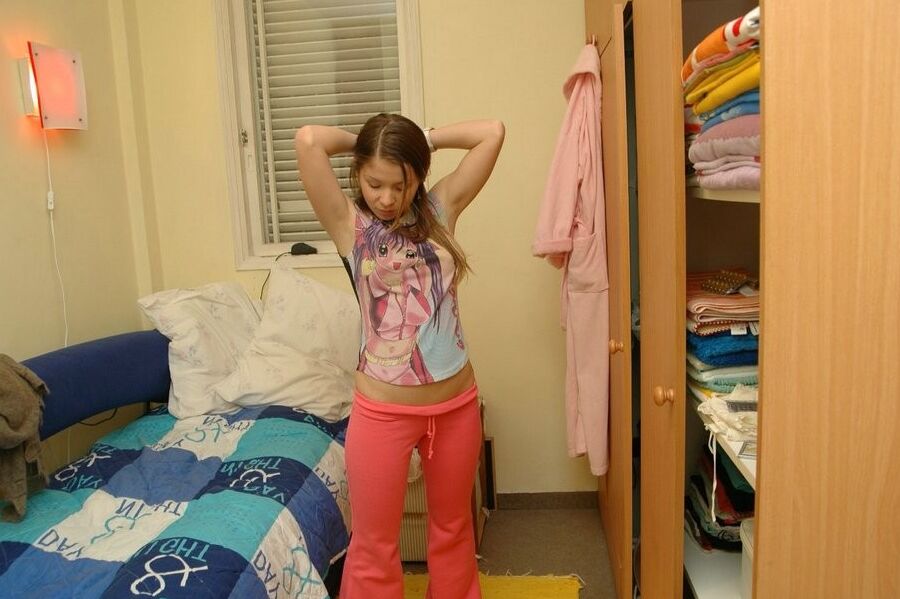 Teen emily being goofy in her bedroom