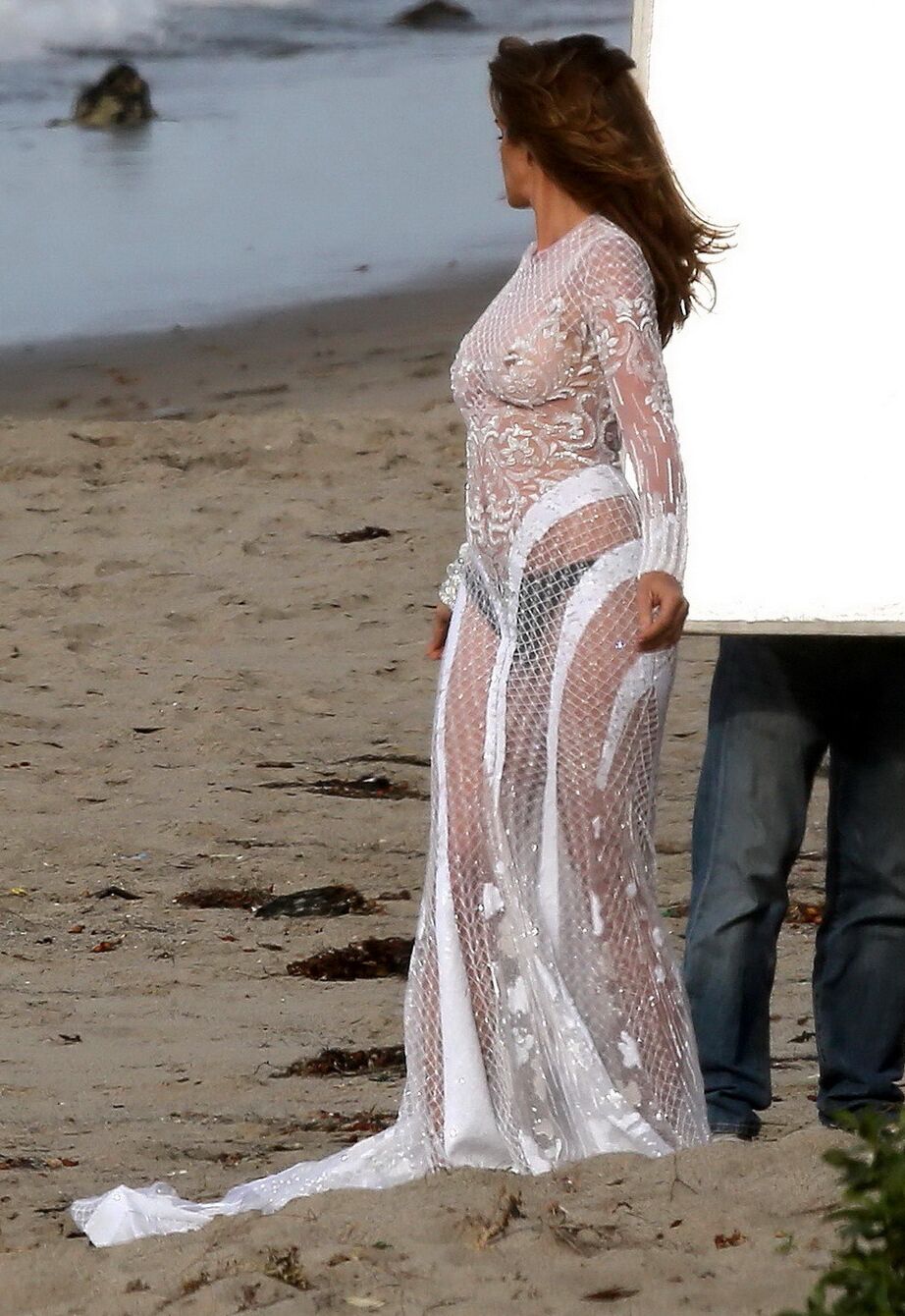 Cindy Crawford braless wearing a see through dress at the photoshoot in Malibu