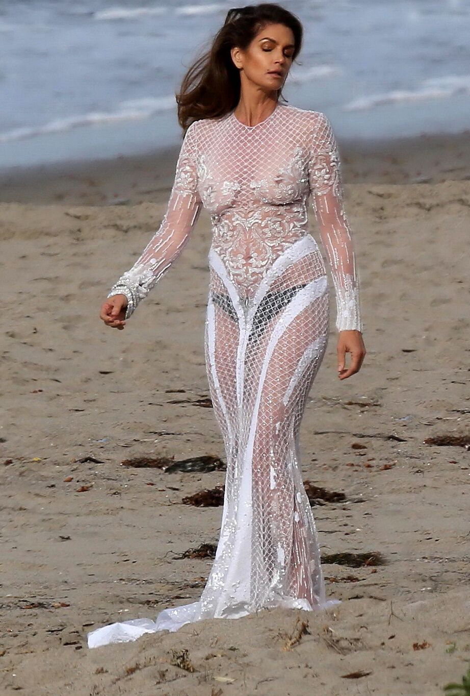 Cindy Crawford braless wearing a see through dress at the photoshoot in Malibu