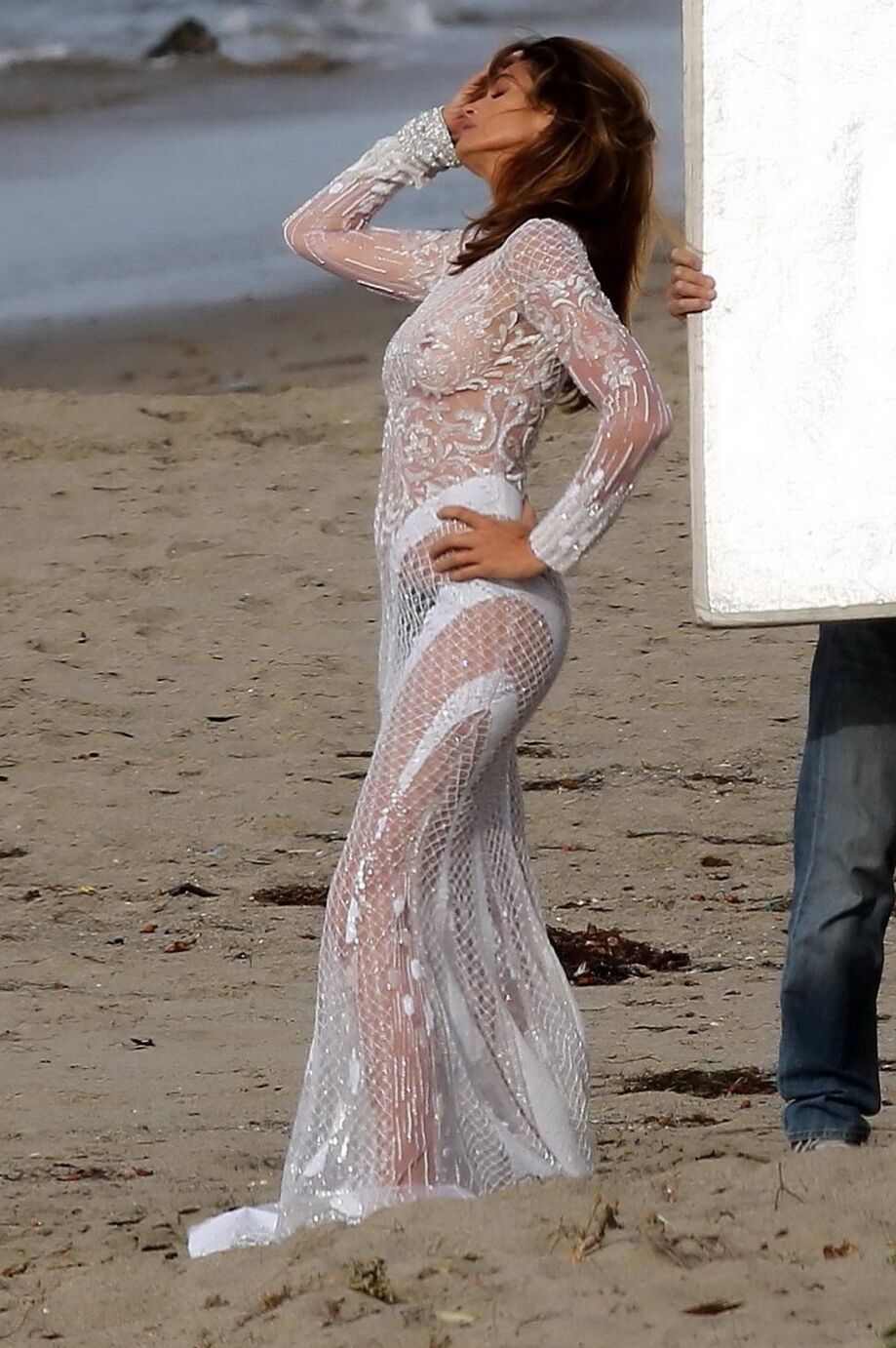 Cindy Crawford braless wearing a see through dress at the photoshoot in Malibu