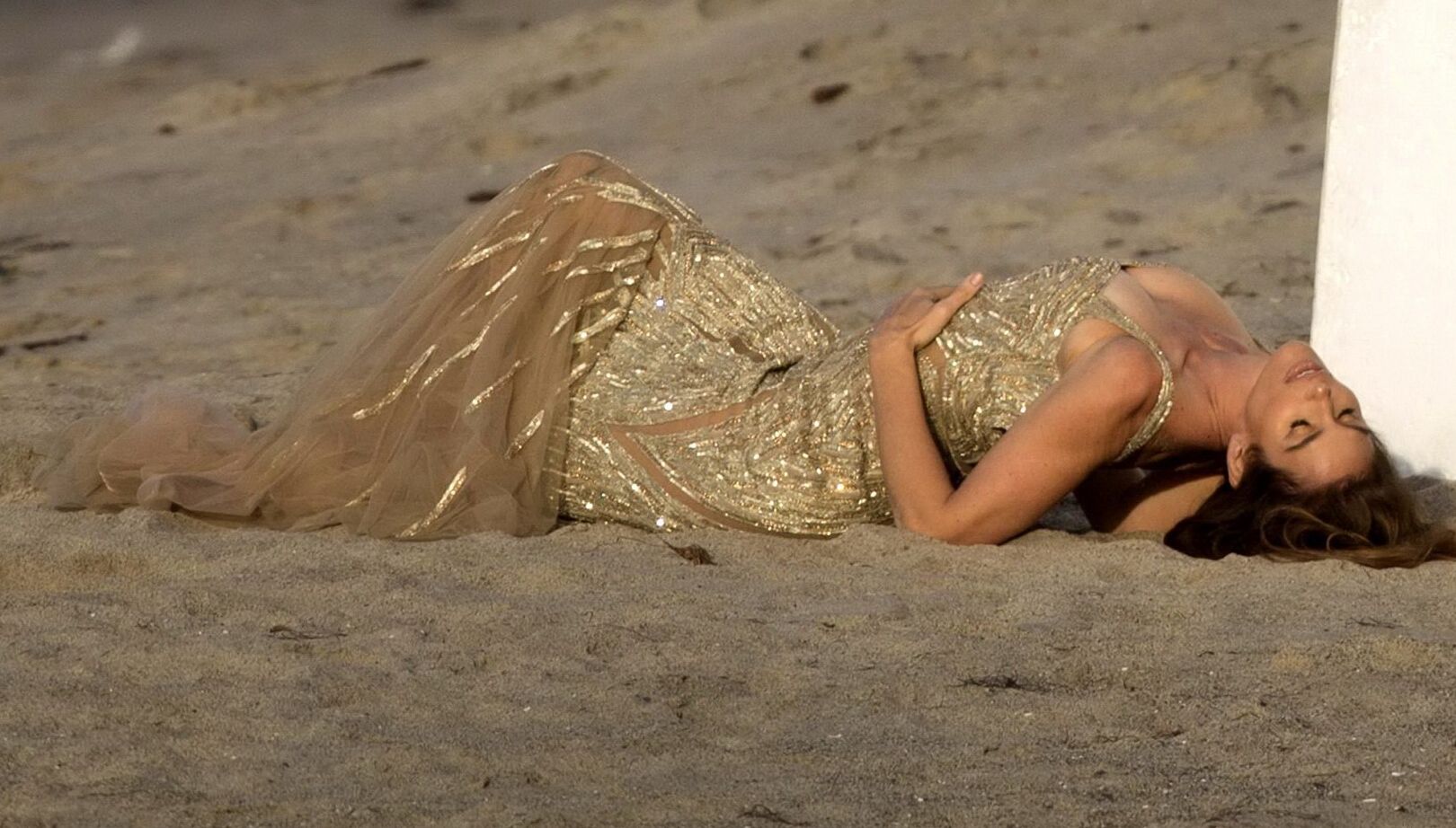 Cindy Crawford braless wearing a see through dress at the photoshoot in Malibu