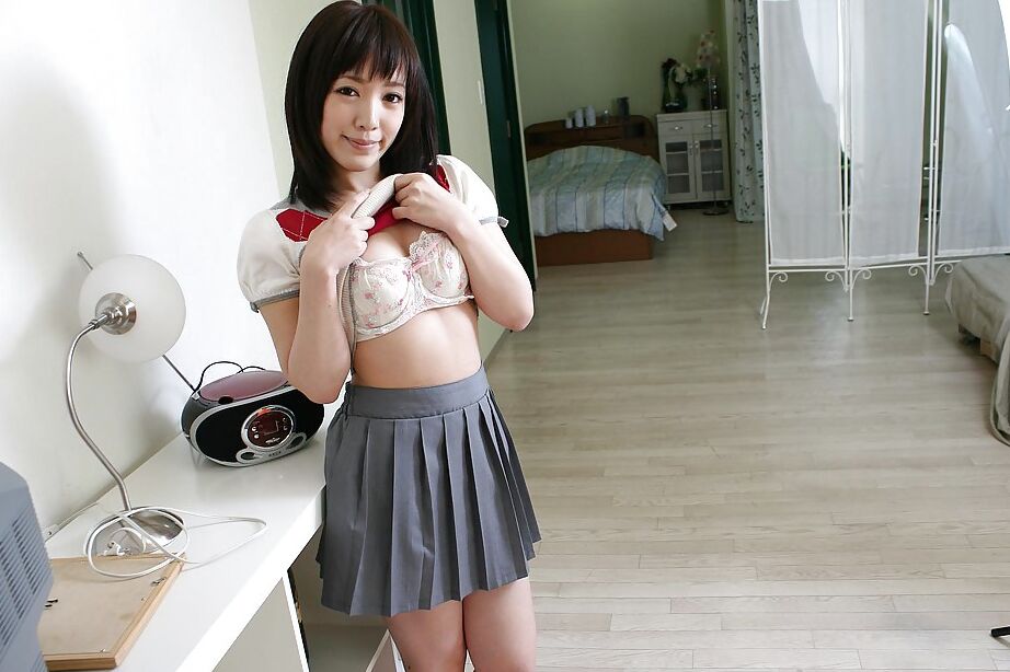 Adorable asian teen Satsuki Ejiri undressing and showcasing her pink pussy