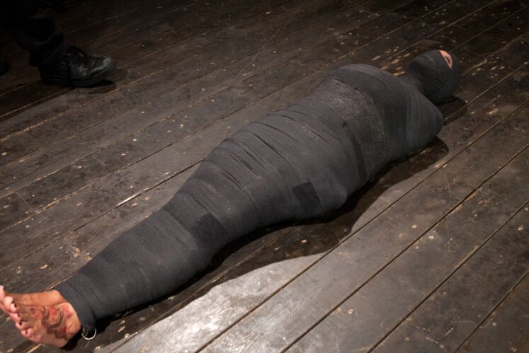 Trina Michaels busty babe is mummified bound and smothered