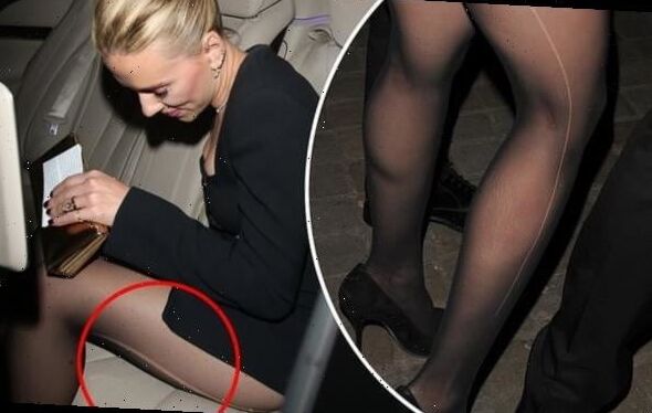 Scarlett Johansson in ripped pantyhose