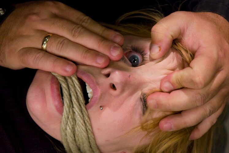 Shaved red head, gets severely bound, and forced to cum. Hogtied.