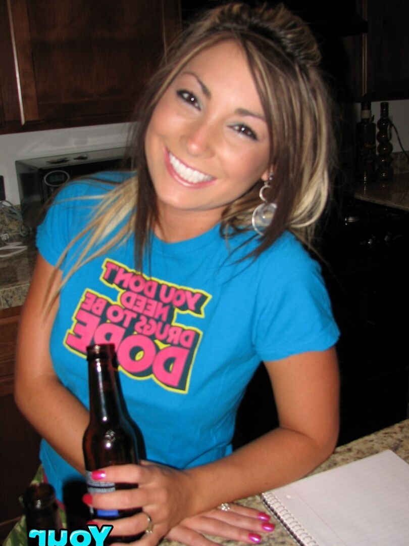 Girlfriend with nice round large breasts take some hot self pics in her house