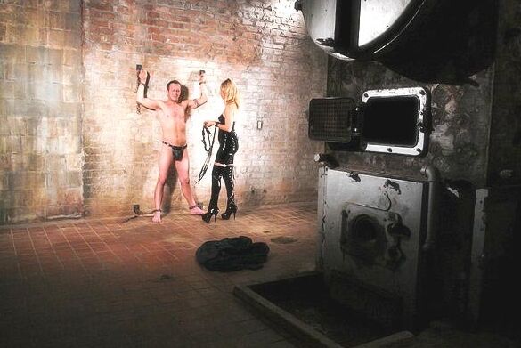 Mistress in boots subdues male submissive