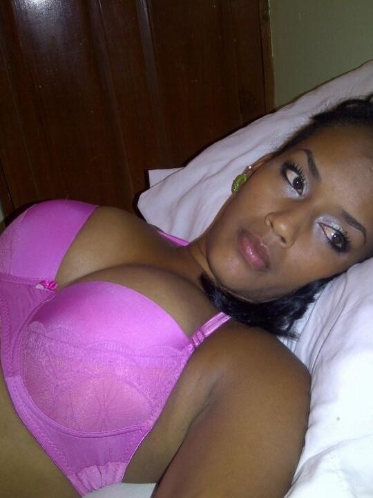 Gorgeous ebony babe busty while teasing and posing