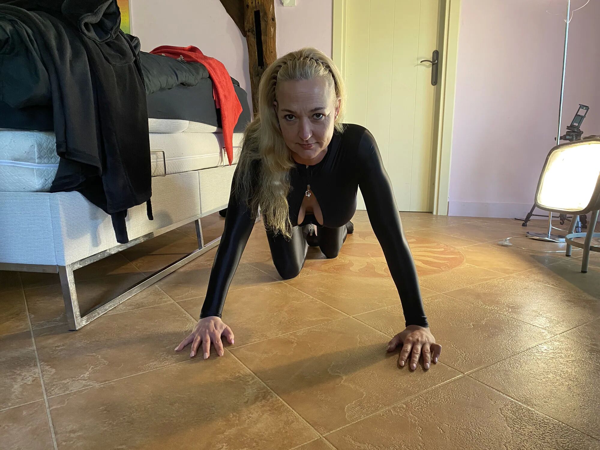 Horny MILF in catsuit - 22 Pics