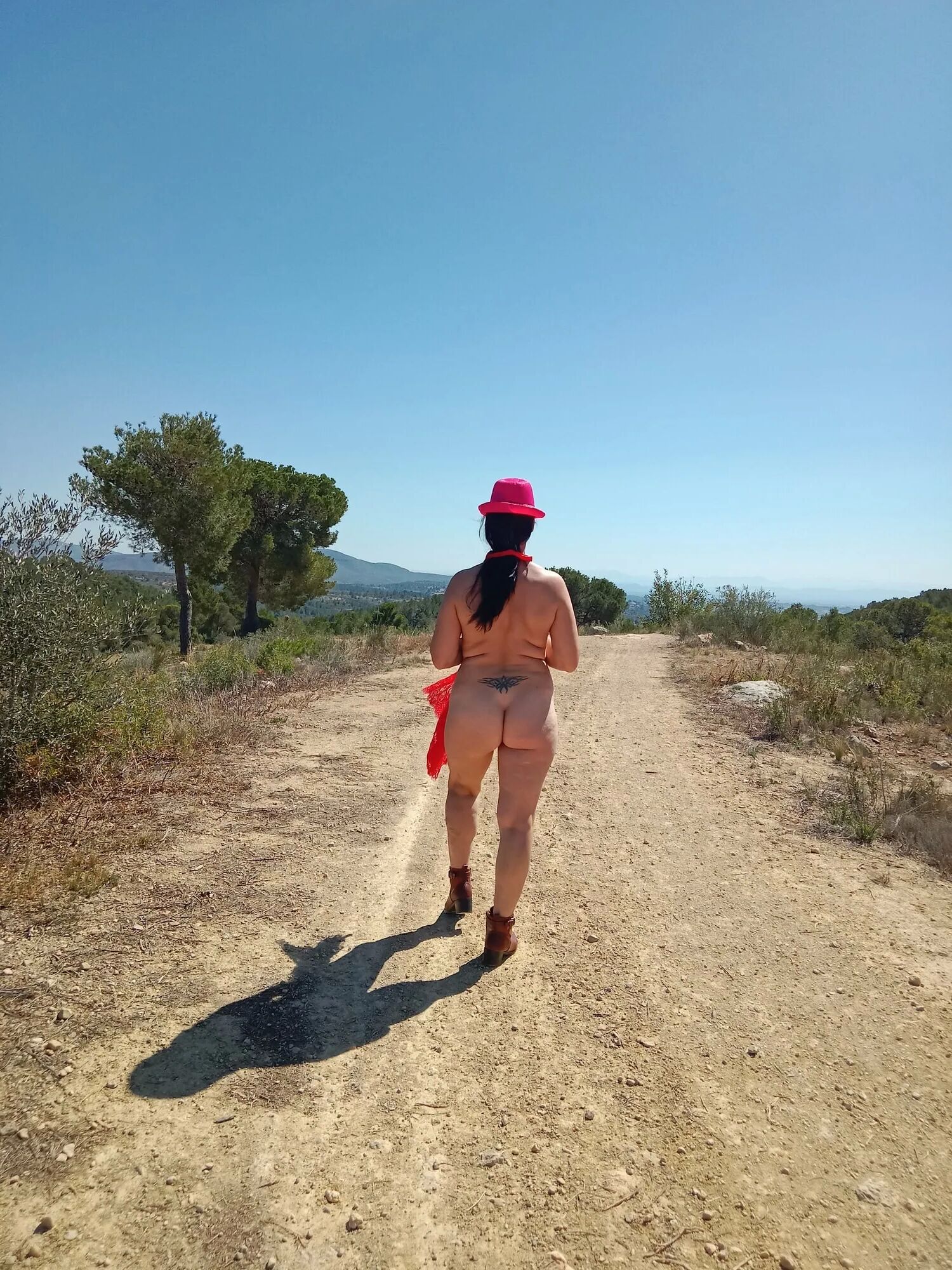 A naked woman on a mountain top - 7 Pics