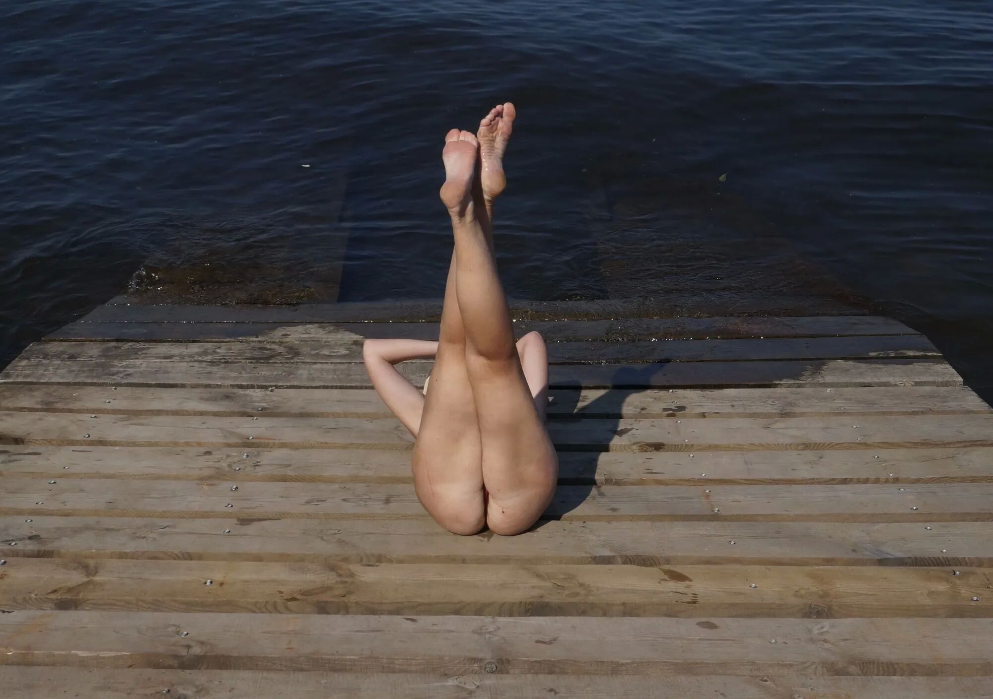 Legs play on a wooden platform - 36 Pics