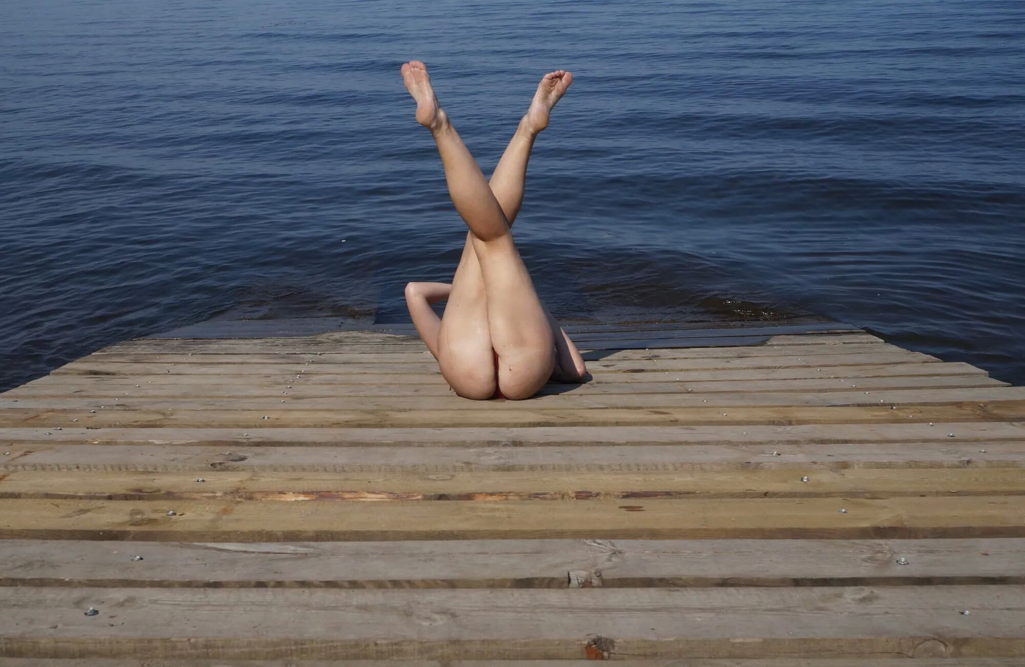 Legs play on a wooden platform - 36 Pics