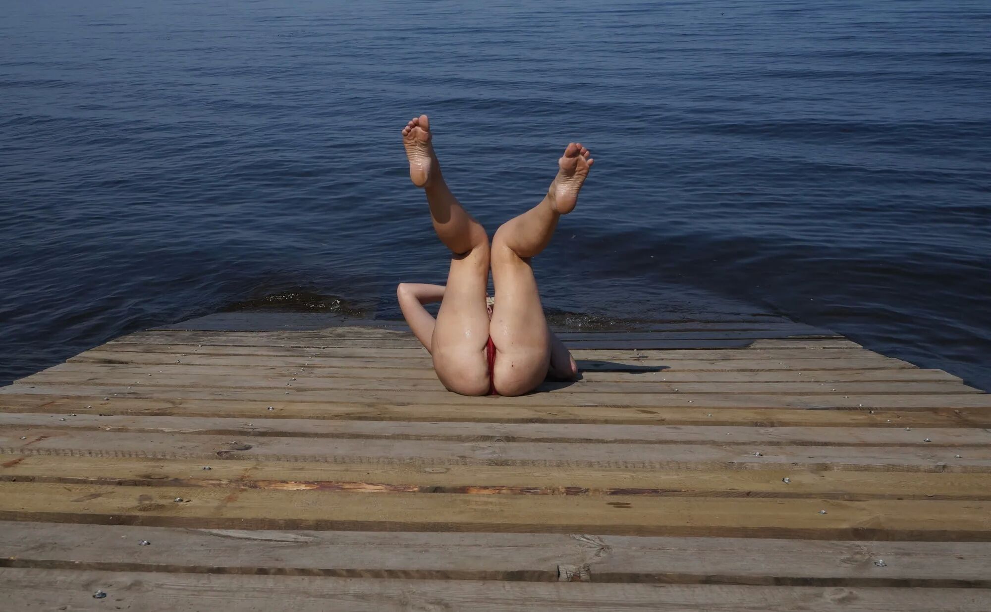 Legs play on a wooden platform - 36 Pics