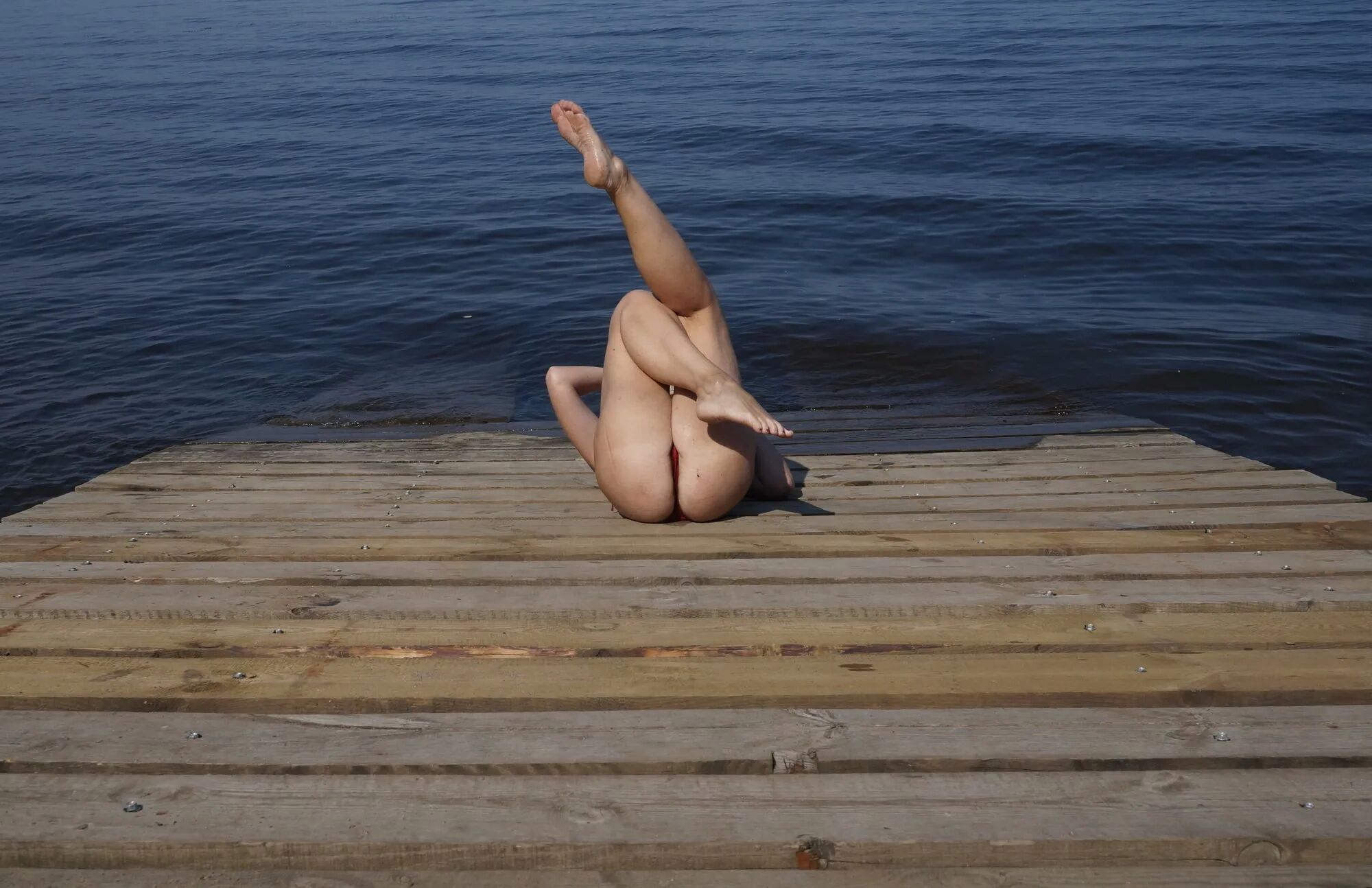 Legs play on a wooden platform - 36 Pics