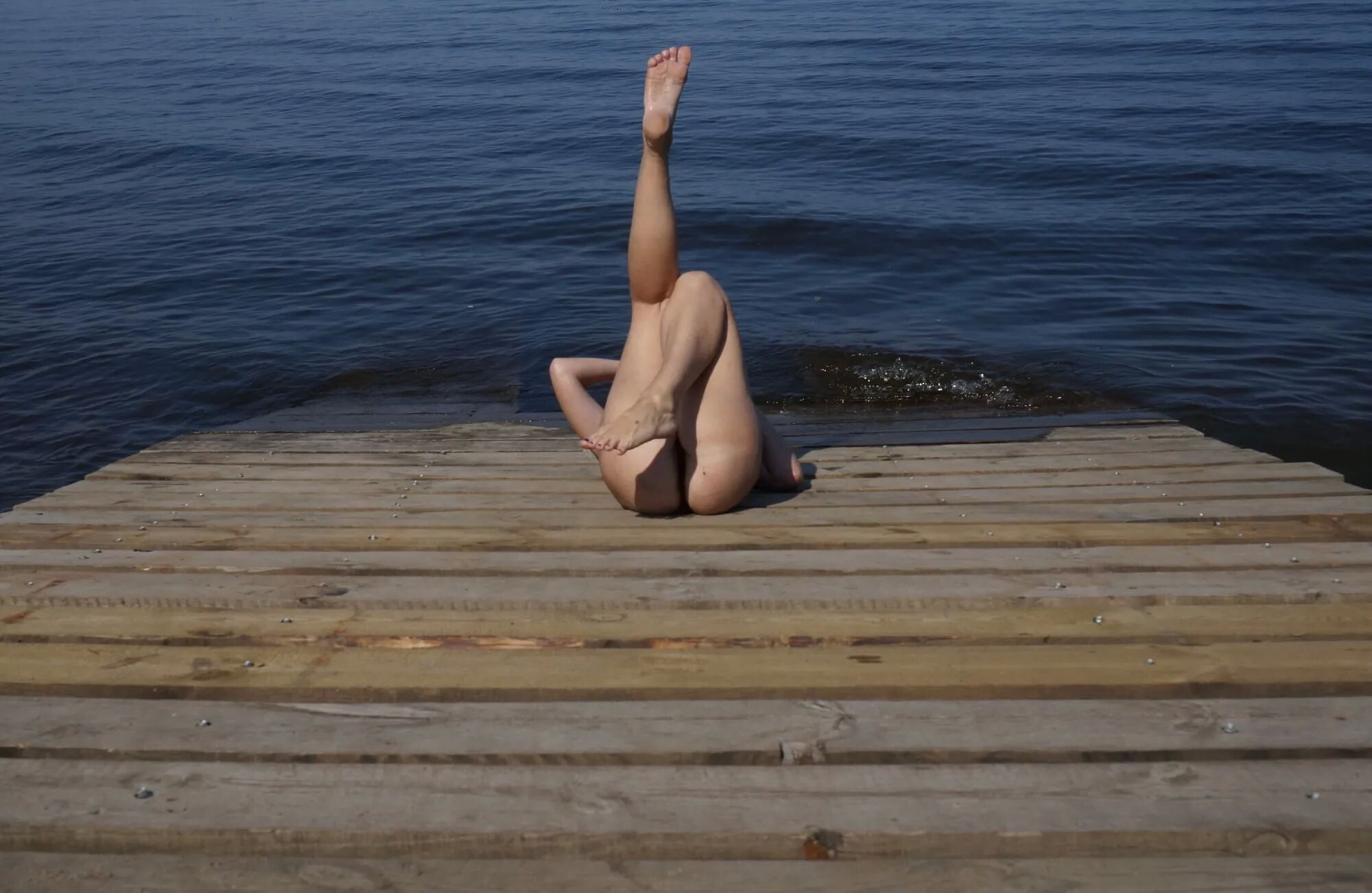 Legs play on a wooden platform - 36 Pics