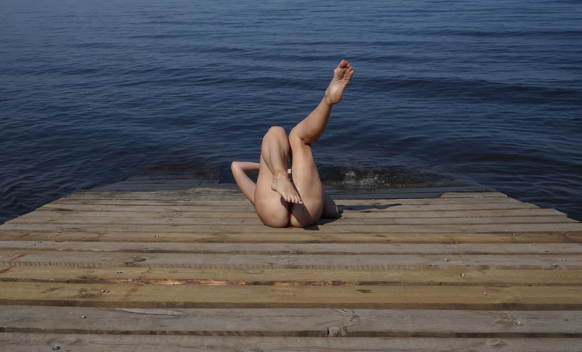 Legs play on a wooden platform - 36 Pics