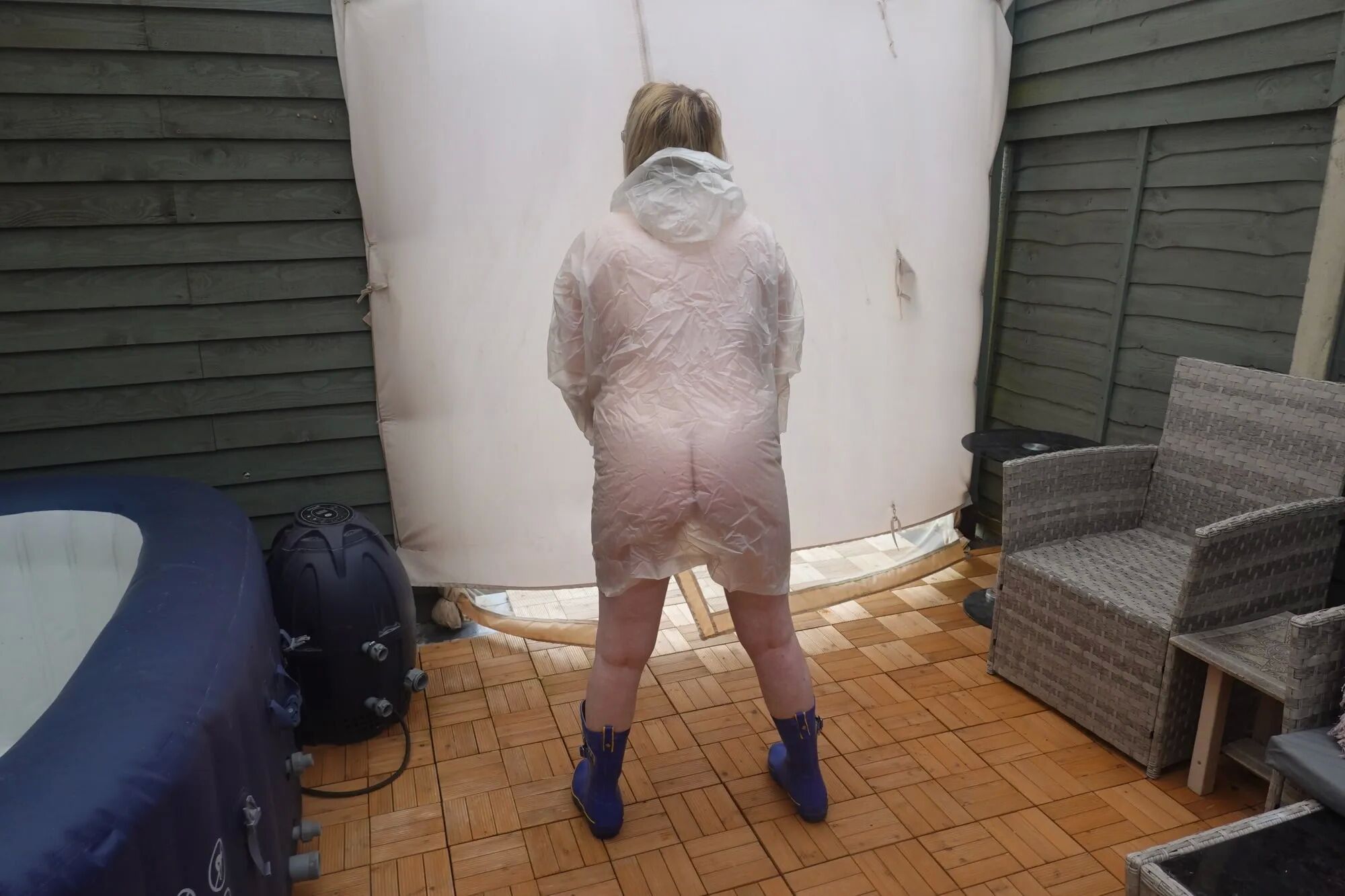 British Tart in transparent plastic Mac and wellingtons - 19 Pics