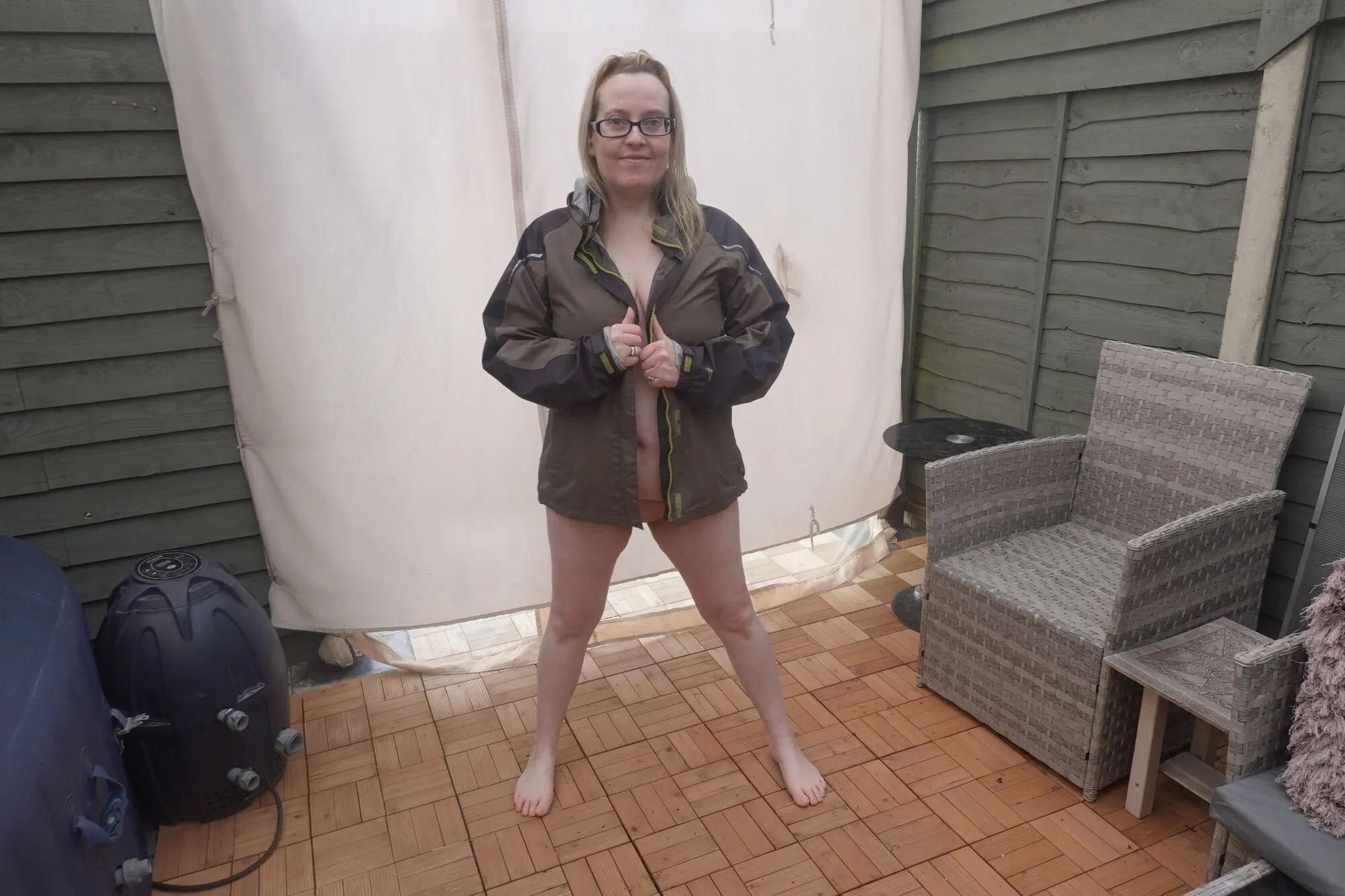 Shooting in the cold yard naked bare feet and coat - 24 Pics