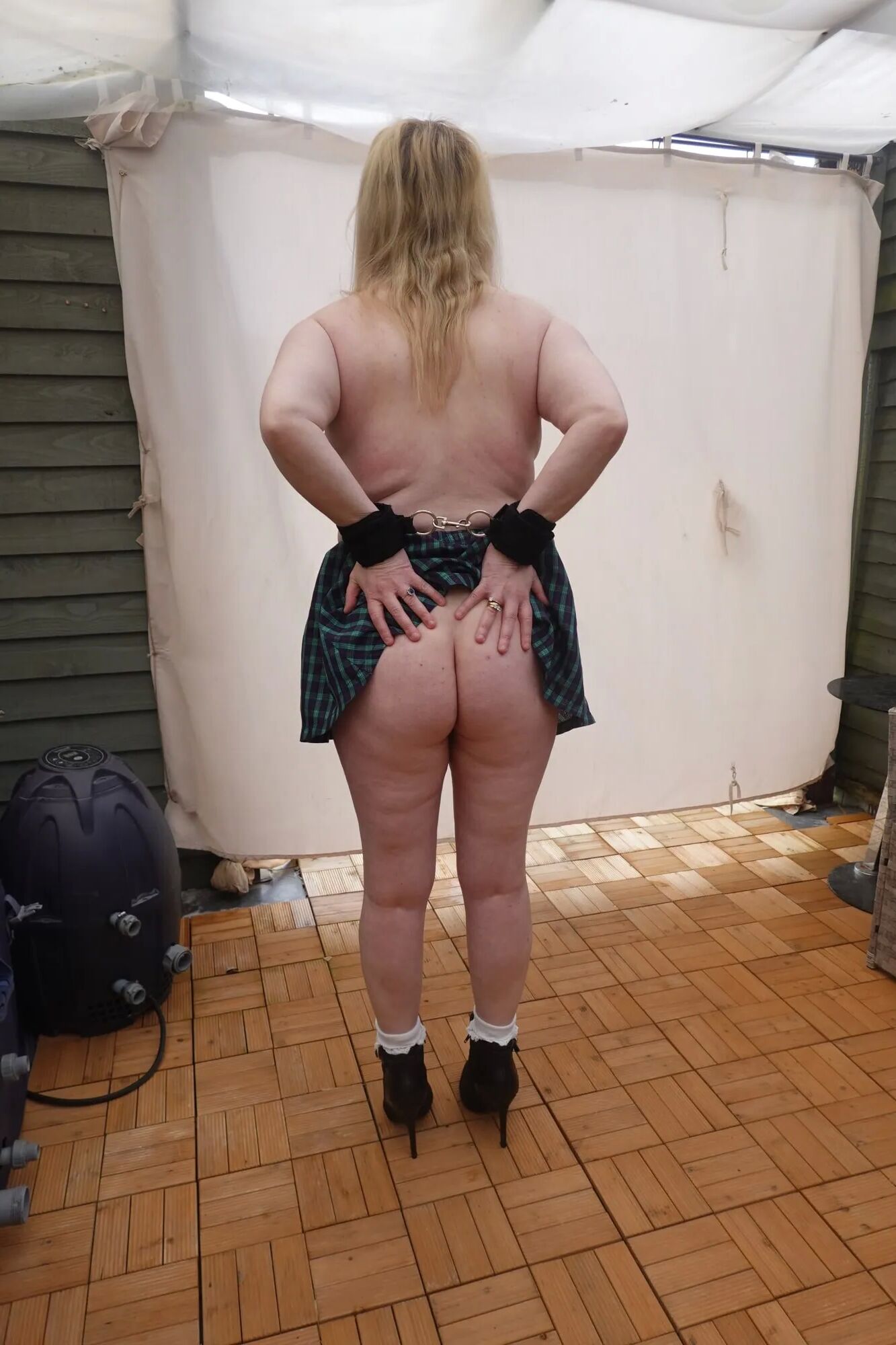 Shy Schoolgirl stripped to skirt and heels cuffed - 28 Pics