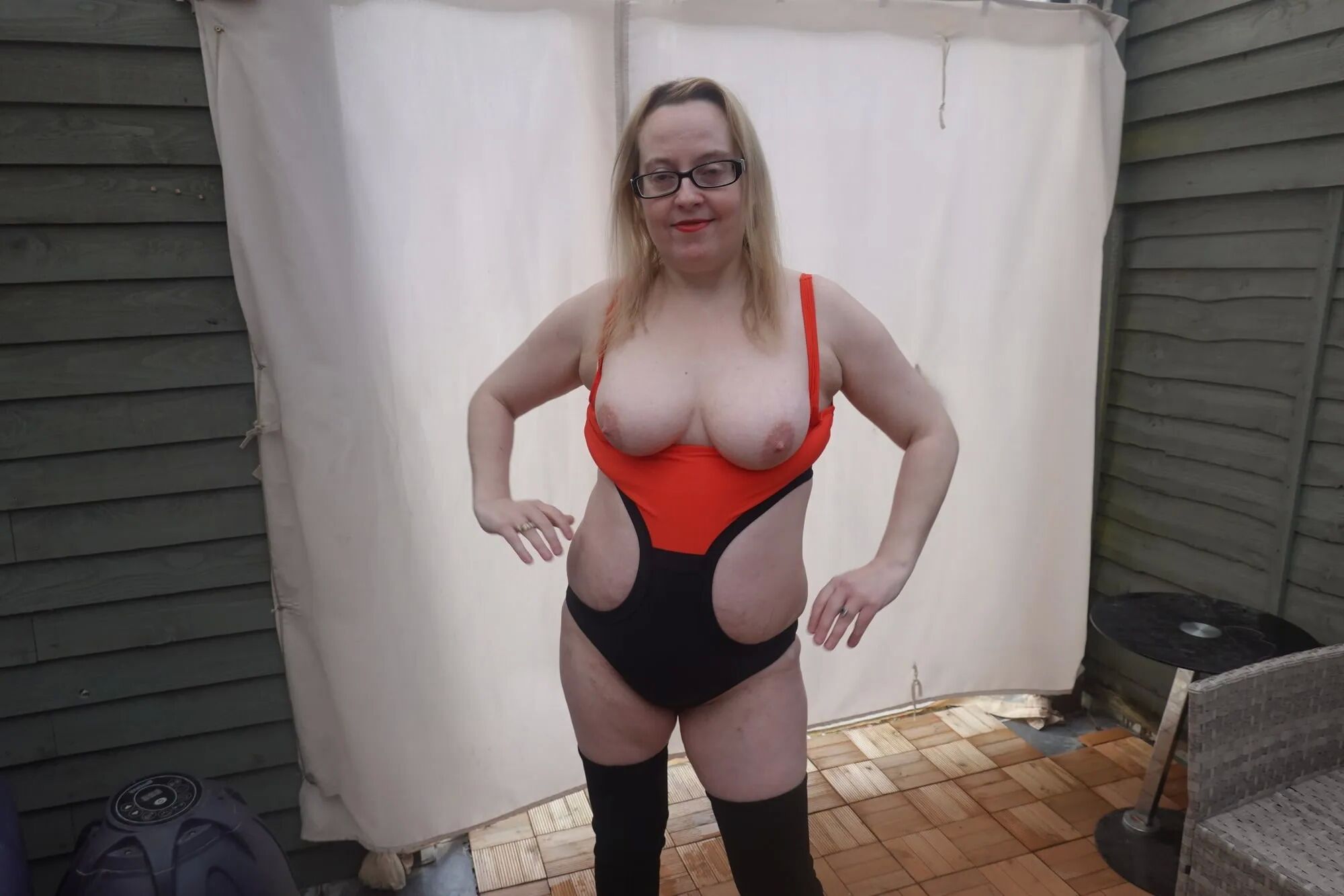 In the yard in 2 Degrees temp in swimsuit and thigh boots - 34 Pics