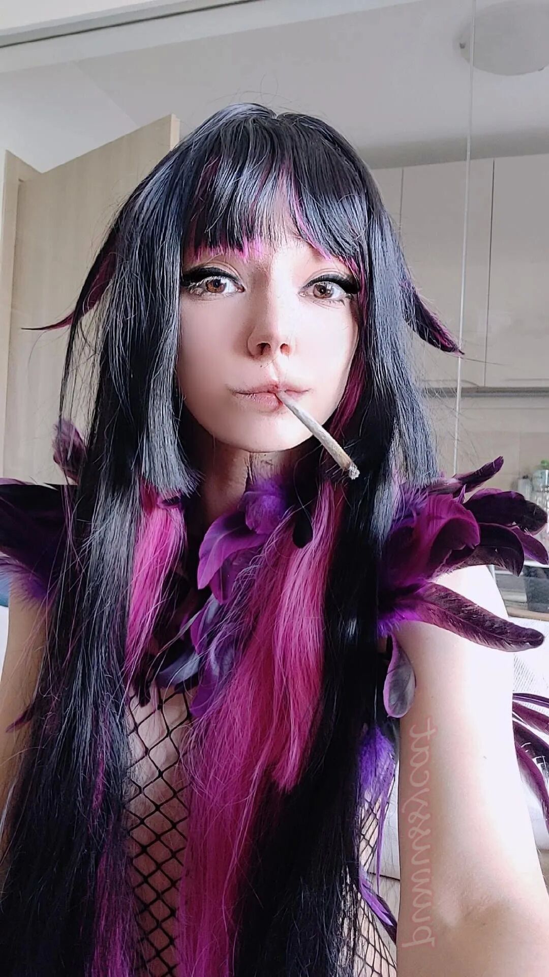 Succubus Smoking in fishnets - 8 Pics