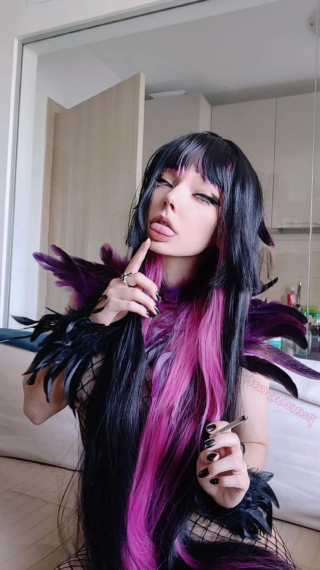Succubus Smoking in fishnets - 8 Pics