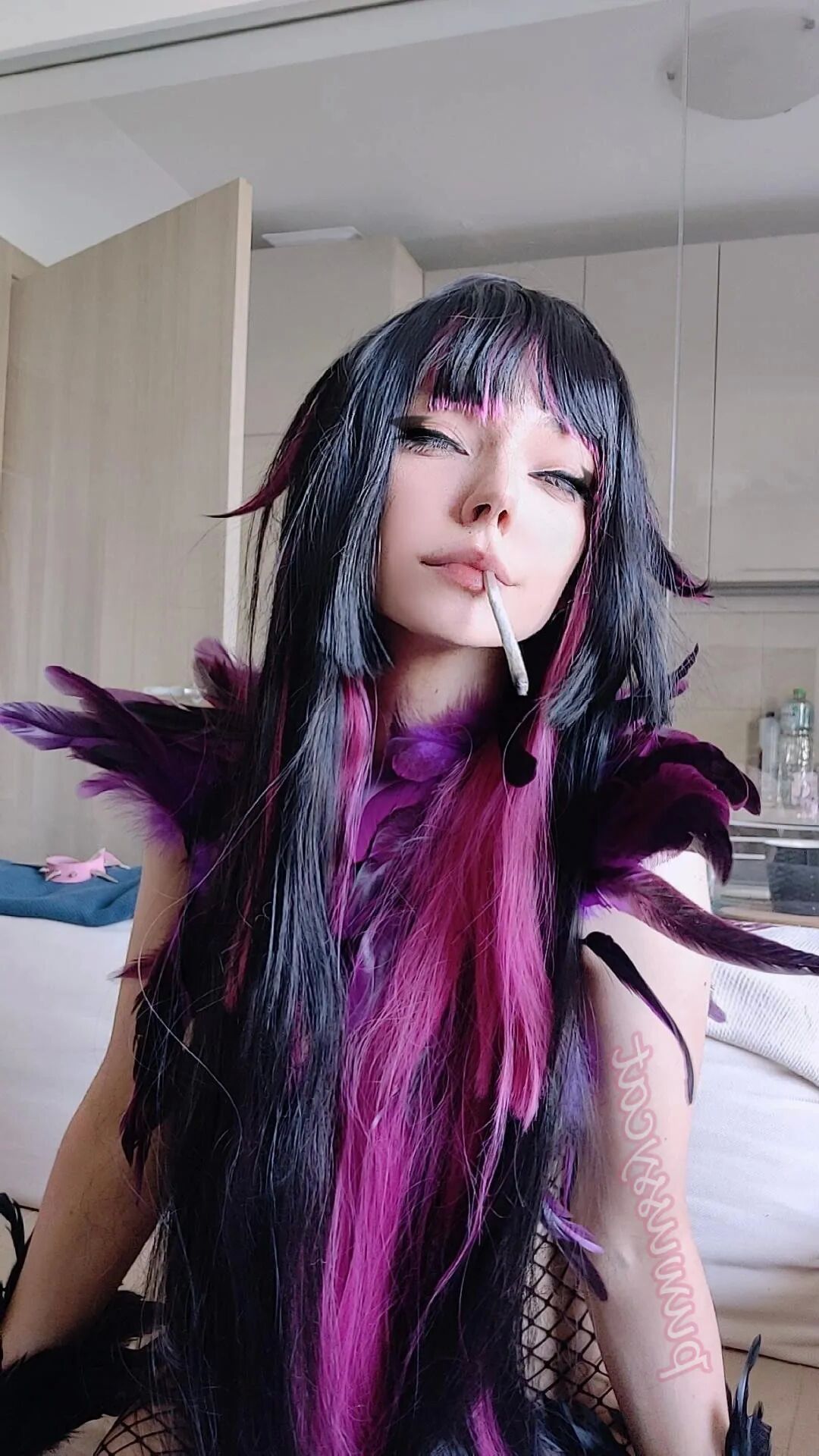 Succubus Smoking in fishnets - 8 Pics