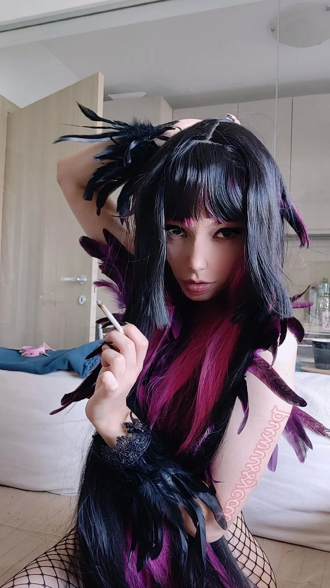 Succubus Smoking in fishnets - 8 Pics