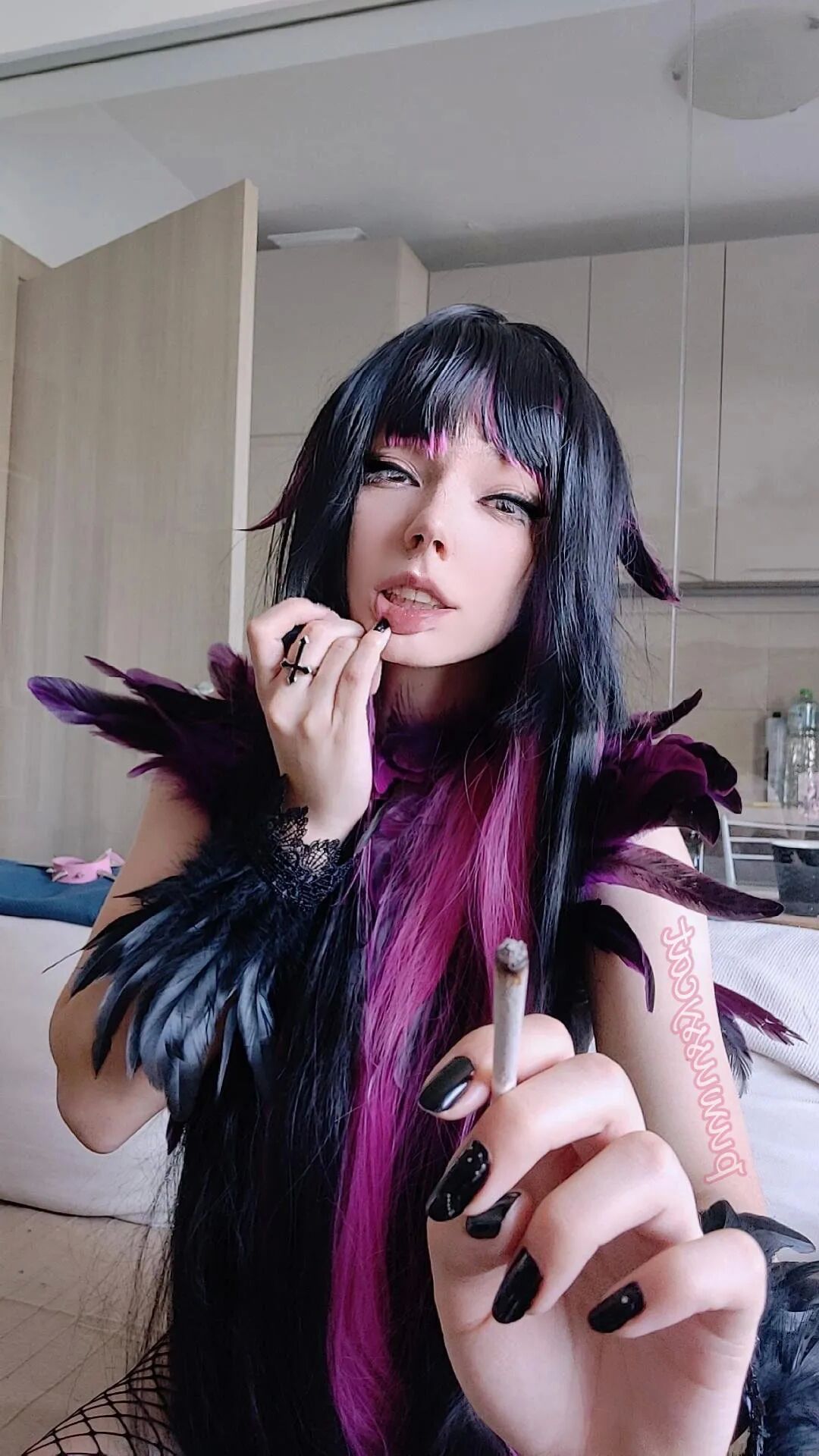 Succubus Smoking in fishnets - 8 Pics