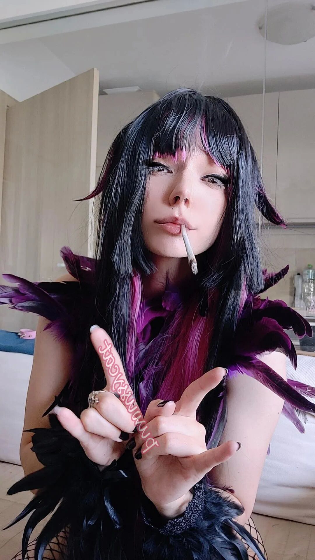 Succubus Smoking in fishnets - 8 Pics