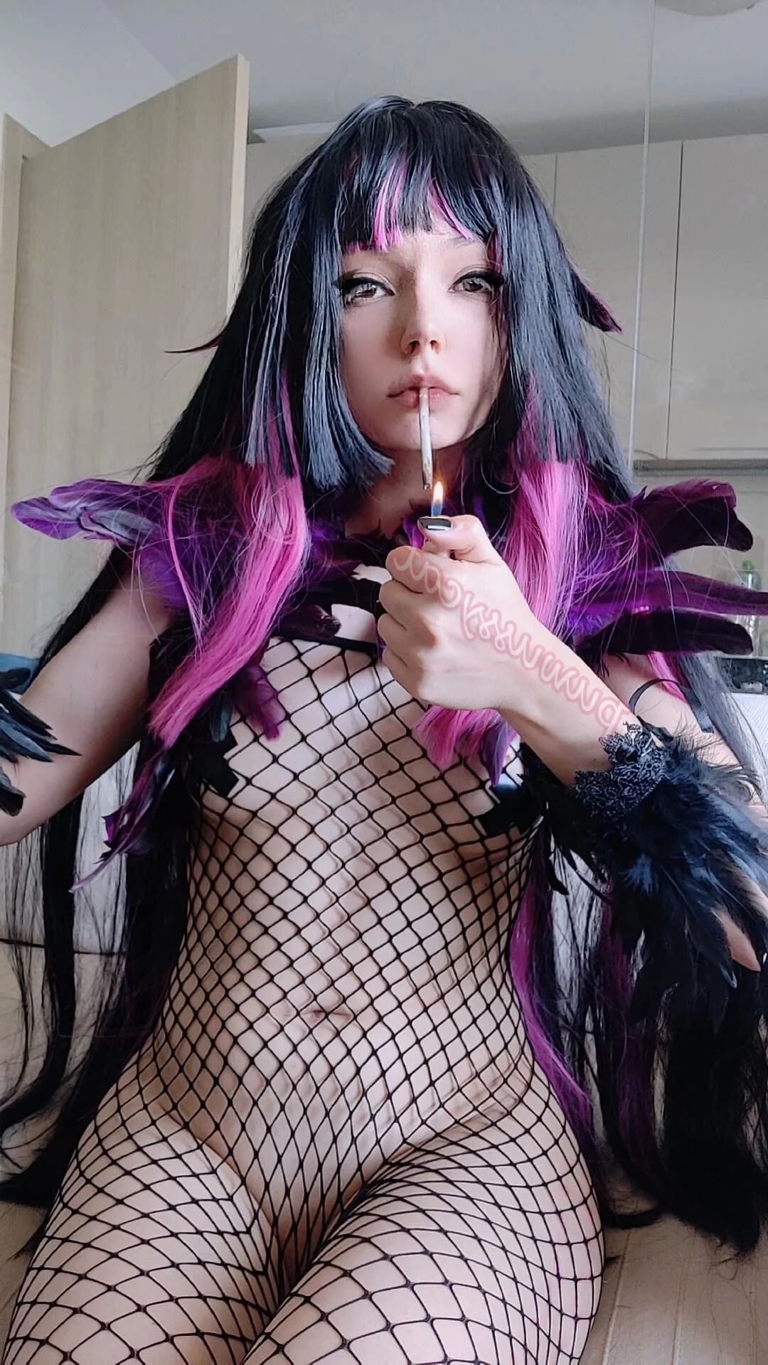 Succubus Smoking in fishnets - 8 Pics