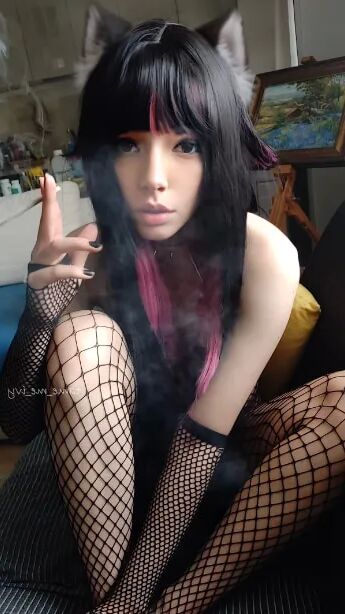 Succubus Babe smoking in fishnets - 26 Pics