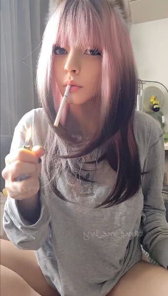 Cute Egirl smoking and showing her titties - 10 Pics