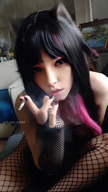 Succubus Babe smoking in fishnets - 26 Pics