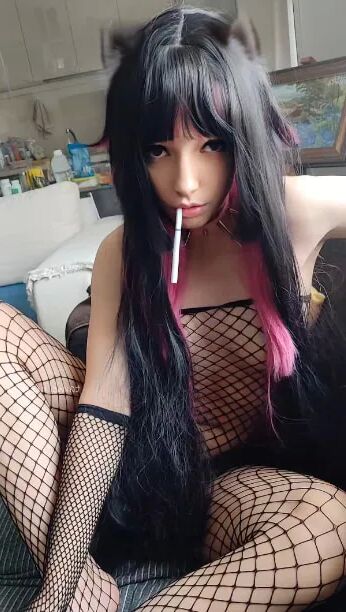 Succubus Babe smoking in fishnets - 26 Pics