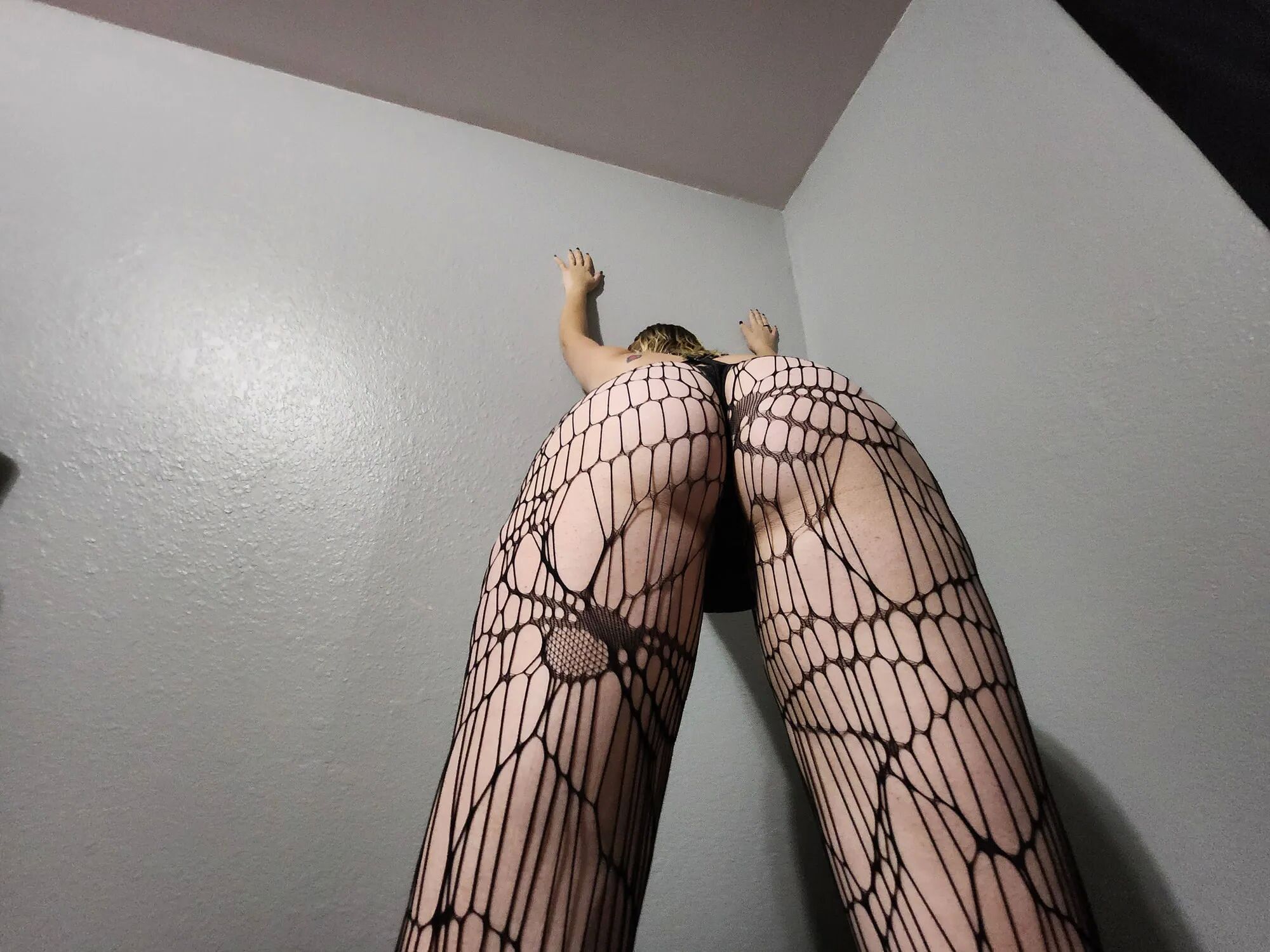 A slut in fishnets - 21 Pics