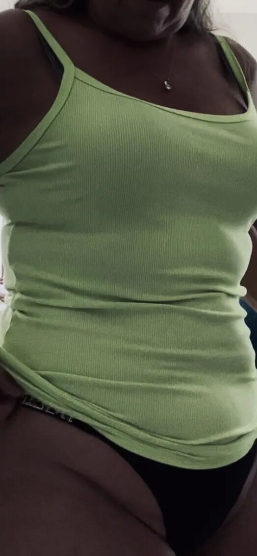 The Real Deal showing her fat ass in lime green and thong - 8 Pics