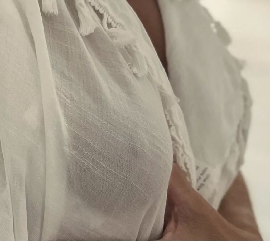 The Real Deal MILF using a sarong to dress up and tease - 10 Pics