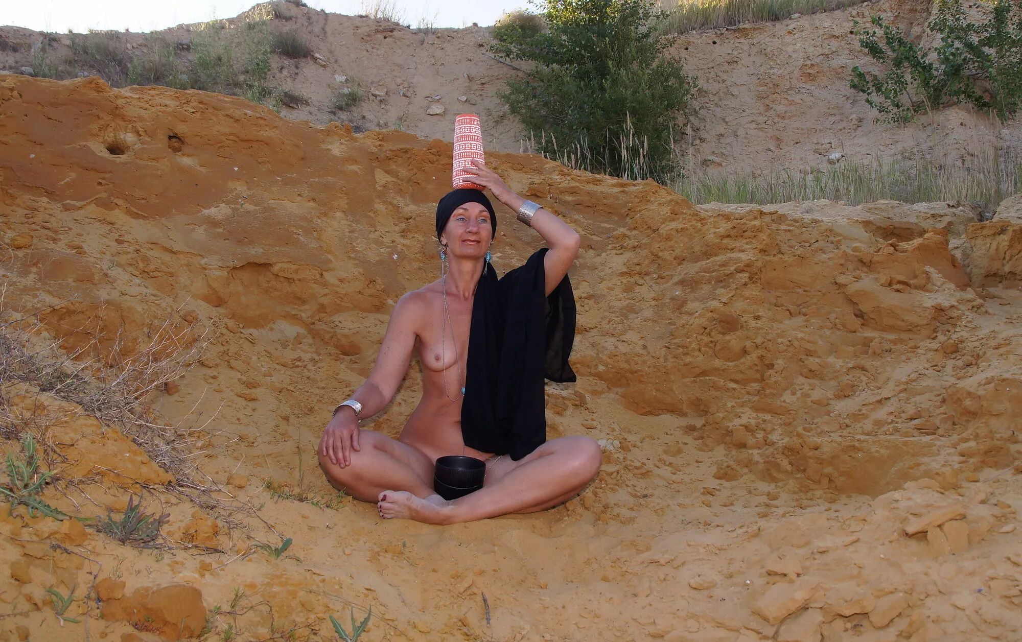 On sand seminude with light-color vase - 35 Pics